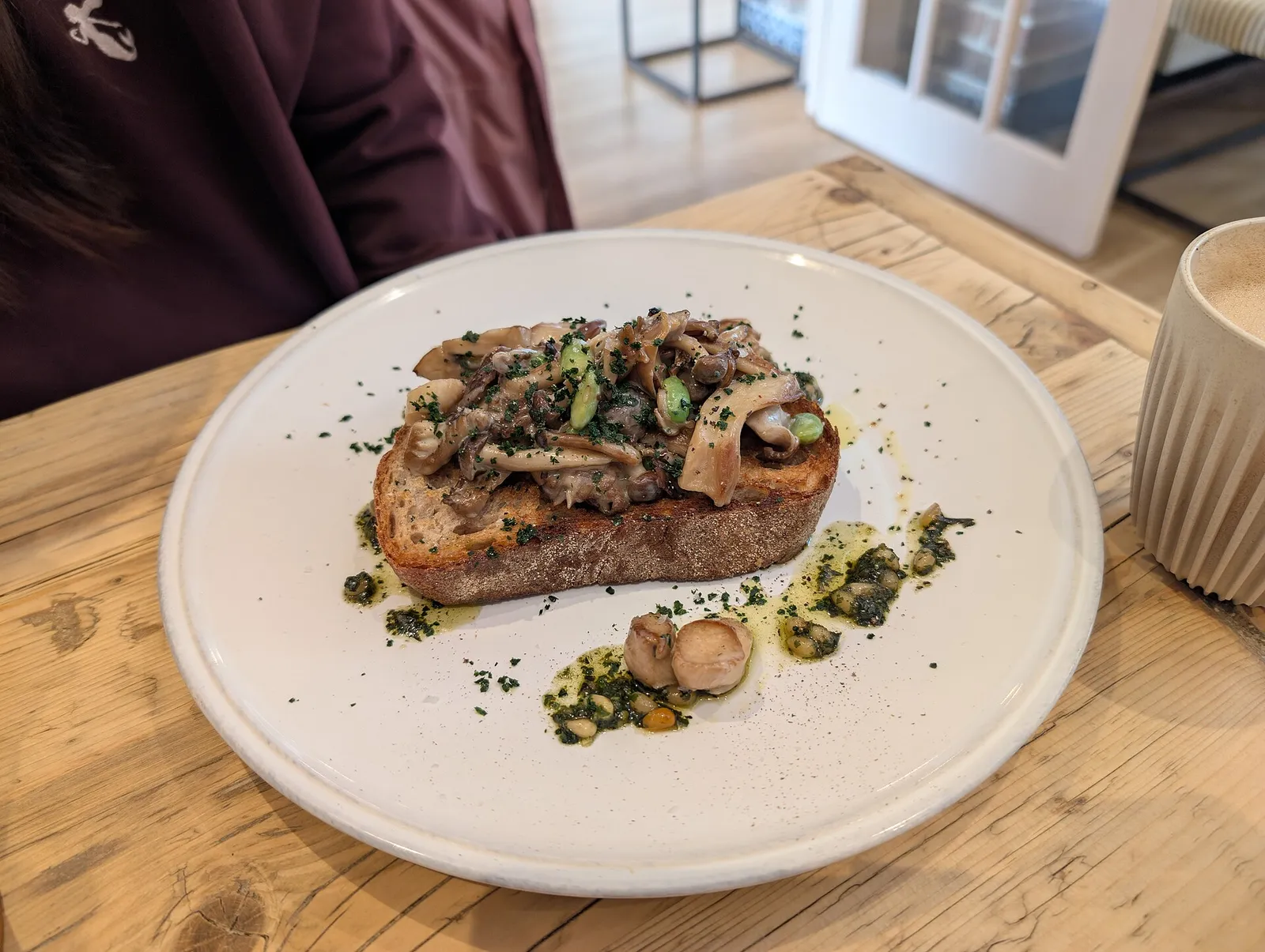 Mushrooms & broad beans on toast — illustrative photograph